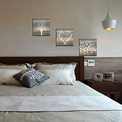 Bedroom with wall art and modern decor.