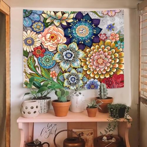 Colorful floral wall art with potted plants on a shelf.