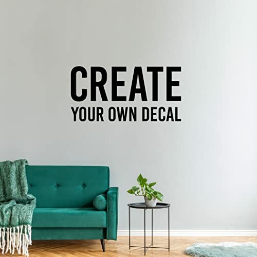 Living room with teal sofa and custom wall decal text.