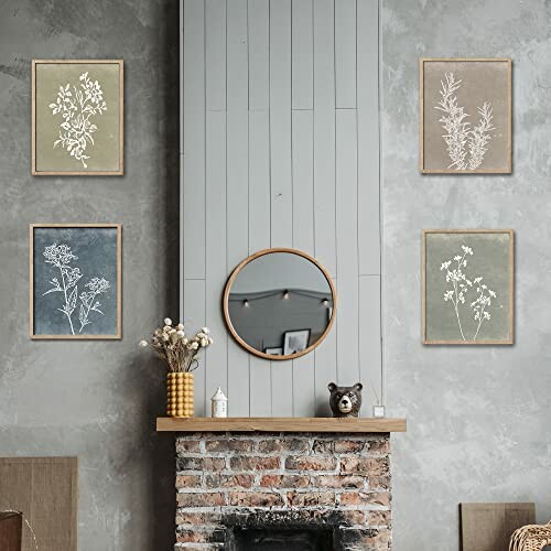 Framed botanical prints and a round mirror above a fireplace.