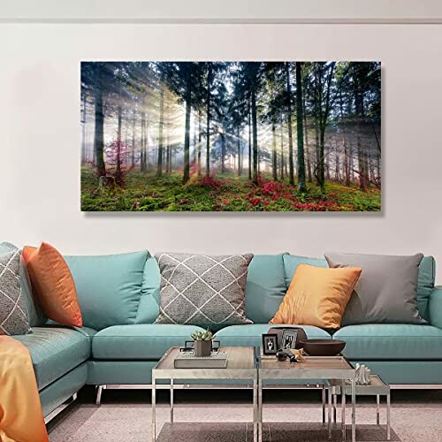 Forest artwork on living room wall with colorful sofa.