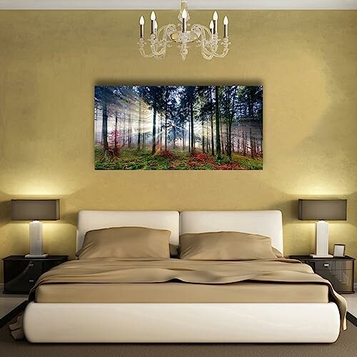 Bedroom with forest wall art above bed, modern decor.