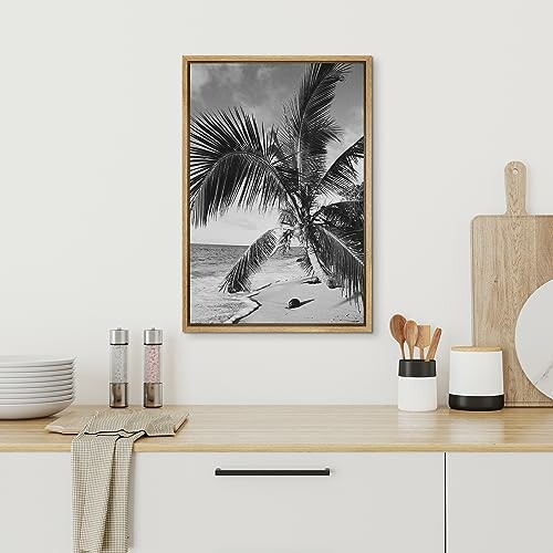 Kitchen counter with a framed beach photo.