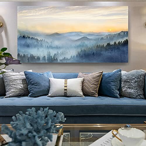 Living room with blue sofa and mountain landscape painting.