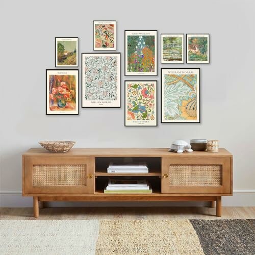 A mid-century modern living room with wooden sideboard and framed art on the wall.