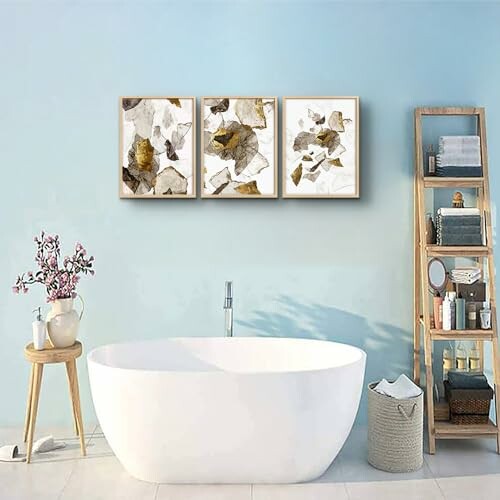 Modern bathroom with white tub, wooden shelves, and abstract art on blue wall.