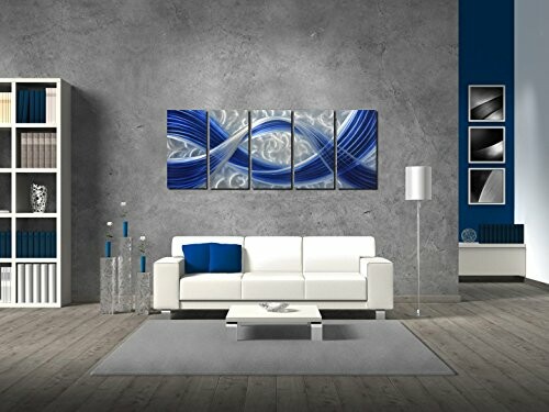 Modern living room with abstract blue artwork and white furniture