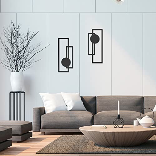 Modern living room with geometric wall art and stylish furniture.