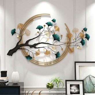 Modern wall art with gold and teal leaves on a branch.