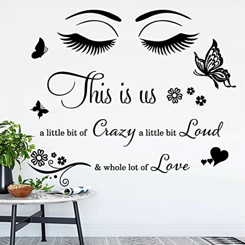 Wall decal with eyelashes, butterflies, and quote about love and life.