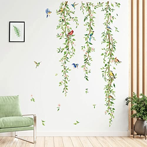 Room with wall decor of hanging vines and colorful birds.