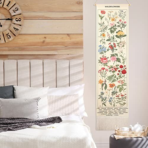 Bedroom with wildflower botanical wall art hanging beside bed.